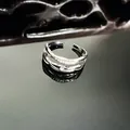 Detailed macro shot showing a silver double-layered ring with micro-pave cz stones - Double Layer Cross Style (3号)