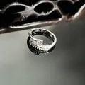 Macro detail view of an elegant silver snake-shaped ring with micro-pavé sparkling crystals - Full Zirconia S Style (7号)