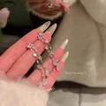 Detailed view of elegant heart and water drop zirconia tassel earrings for women - Heart Teardrop Tassel Style (A2427)