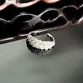 Close-up of an elegant silver ring with full pave cubic zirconia in a wave design - Full Zirconia Wave Style (15号)