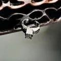 Macro detail of a sparkling silver ring with micro-pave diamonds on a dark surface - Square Cluster Main Stone Style (19号)