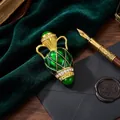 Luxurious French vintage gold vase brooch with green enamel and crystal accents - Vase Shape / Green