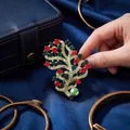 Elegant Christmas tree rhinestone brooch with sparkling red and green crystals on blue - Vintage Red Green Rhinestone Tree Style (825058)