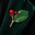 Elegant forest style plant brooch featuring green enamel leaf and vibrant red berries - Green Leaf Red Holly Berry Gold Branch Style (824344)