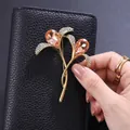 Elegant champagne pear-shaped crystal flower brooch with gold plating for banquet dress - Champagne Pear Crystal Streamline Flower Style (XD824398-2)