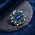 Luxury vintage blue crystal glass starfish brooch with green pavé stones on slate - Ancient Gold Blue