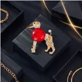 Vintage gold poodle brooch with vibrant red glass and sparkling rhinestone accents - Red Glass Poodle / Gold