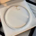 Elegant minimalist seed pearl choker necklace with gold finish extender chain in box. - Pearl Necklace (RF479) / 2.0mm / Gold