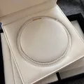 Elegant small white pearl choker necklace displayed in a luxury cream velvet jewelry box - Pearl Necklace (RF479) / 4mm / Gold