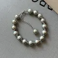 Elegantes graues Glasperlenarmband mit verstellbarer silberner Verlängerungskette - Silber