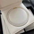 Elegant white round pearl necklace variant displayed in a premium jewelry gift box - Pearl Necklace (RF479) / 8mm / Gold