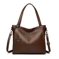 Stylish brown textured leather tote bag with kangaroo logo and adjustable crossbody strap - Dark Brown