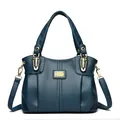 Elegante bolso de mano de piel azul de gran capacidad con bandolera extraíble - Azul