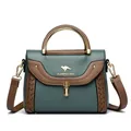 Elegant green and brown colorblock crossbody handbag with braided detail and golden logo - Green