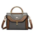Elegant grey and brown contrast small square bag with woven details and gold handle. - Dark Gray