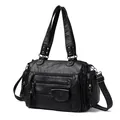Bolso de mano estilo motero negro con múltiples bolsillos y correas muy versátiles - Negro