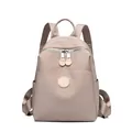 Waterproof nylon women's backpack in beige for travel and daily commute - Small Pink