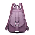 Elegant purple soft leather backpack featuring a stylish front buckle and flap closure - Purple