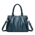 Elegante bolso de mano en cuero azul oscuro con un diseño plisado sofisticado mujer - Azul