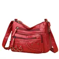 Elegant red washed leather crossbody bag for women with multi-zipper compartments - Red