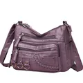 Functional purple washed leather crossbody bag with multiple organizational pockets - Purple