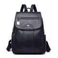 Navy blue faux sheepskin backpack for women with kangaroo logo and large capacity - Dark Blue