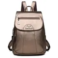 Bronze faux leather backpack with metallic texture and kangaroo logo detail. - Gold