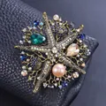 Exquisite vintage starfish brooch with colorful rhinestones and a large pink pearl - Antique Gold Champagne Starfish