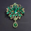 Vintage green glass rhinestone large brooch with gold alloy finish for women - Green