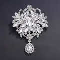 Vintage silver alloy brooch with large pear-shaped rhinestones and dangling crystal - White (Silver Base)