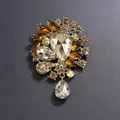 Broche vintage style palais avec cristaux ambrés en forme de goutte et alliage doré - Or Antique (Ambre)