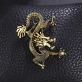 Broche dragon chinois vintage dorée avec détail en strass sur fond en cuir - Or Antique (Dragon Chinois)