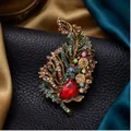 Vintage exaggerated leaf brooch featuring colorful rhinestones on black leather - Antique Gold Colorful Rhinestone Red Teardrop Main Stone Leaf Style (823178)
