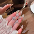 Elegant silver-toned drop earrings featuring sparkling zircon flowers and long chain tassels. - Marquise Rhinestone Flower Long Tassel Style (E6783银) / Silver