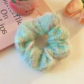Soft fuzzy scrunchie in pastel multi-color woven fabric for cute winter hair styling - Light Blue Knit