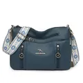 Blue faux leather crossbody bag featuring a wide geometric patterned shoulder strap - Blue