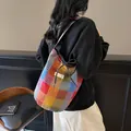 Stylish colorful checkered canvas bucket bag with functional drawstring closure for women - Yellow