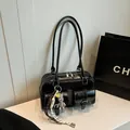 Black glossy faux leather Boston shoulder bag with dual front pockets and teddy bear charm - Style With Charm (FM8513) / Black