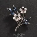 Elegant vintage flower brooch with blue rhinestones and white pearls for coats and bags - Blue Plum Blossom Style (XD8296-2)