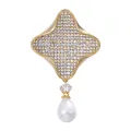Elegant golden four-pointed star brooch featuring pavé stones and a teardrop pearl dangle. - Teardrop - Champagne Gold (TXZ182)