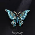 Elegant blue butterfly crystal brooch in vintage gold finish for formal suits and gowns - Sky Blue Crystal Butterfly Brooch (XD10854-3)