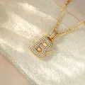 Detailed macro view of high-quality gold-plated iced out letter B hip hop pendant - Letter B / Champagne Gold