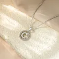 Macro detail of elegant silver necklace featuring a pavé zircon letter C pendant - Necklace C / Silver