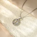 Macro view showing the intricate micro-pave zirconia detailing on the initial letter D pendant - Necklace D / Silver