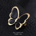Elegante spilla a farfalla in smalto nero con bordo in metallo dorato per accessori donna - Farfalla Nera