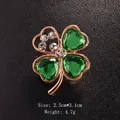 Elegant four-leaf clover brooch pin with green rhinestones and gold finish - Four-leaf Clover Style (XD3026) / Gold Hollow White Rhinestone