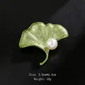 Elegant green ginkgo leaf shaped brooch with white pearl, 3.9x4.4cm size, 10g weight - Ginkgo Leaf Style (XD9474)