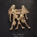 Spilla vintage dorata segno Gemelli con cristalli su sfondo nero - Gemelli (21 mag - 21 giu)