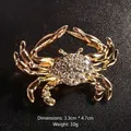 Spilla a granchio vintage dorata con strass brillanti per abiti e cappotti eleganti - Cancro (22 giu - 22 lug)