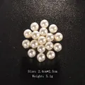 Elegant flower-shaped pearl brooch pin featuring round white pearls, size 2.4cm x 2.5cm. - Floral Arrangement (XD8963-2)